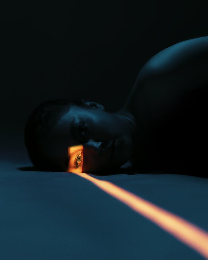 pexels photo 29736390 Artistic portrait using dramatic low light effects, emphasizing mystery.